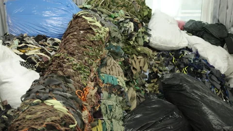 Camouflage seamless mesh pattern. Khaki green camo. Military background holes Stock Footage 172048944