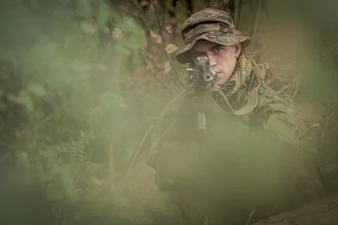 Camouflaged commando assault Stock Photos