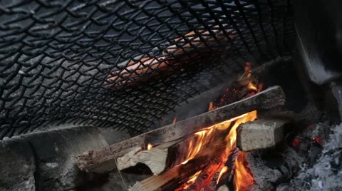 Camp fire with bbq sausages Stock Footage 63199956