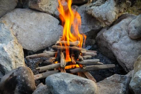 Camp fire being started Stock Photos
