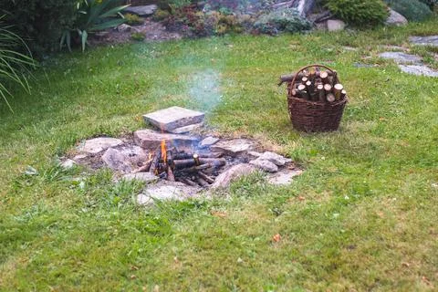 Camp fire in the garden Stock Photos
