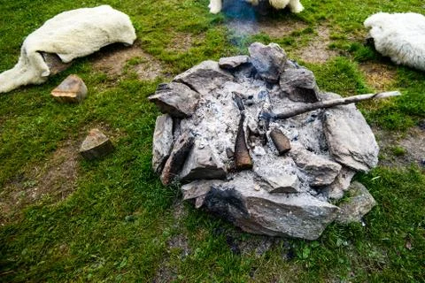 Camp fire made of stone ring, traditional, authentic Stock Photos