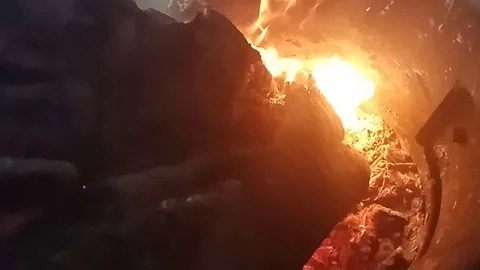 Camp fire at night close up. Slow motion. Stock Footage 115546411