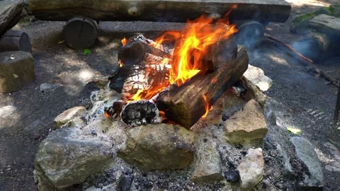 A Camp Fire Pit Surrounded By Rocks Stock Footage 304905122