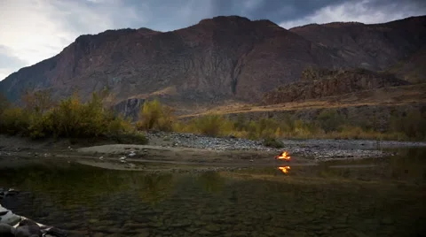Camp Fire on the River Bank Stock Footage 49410843