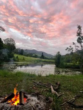Camp fire watching the sunset Stockfoto's
