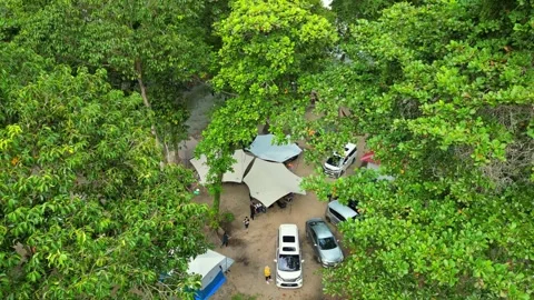Camp ground with lush greenery drone shot Stock Footage 250505389