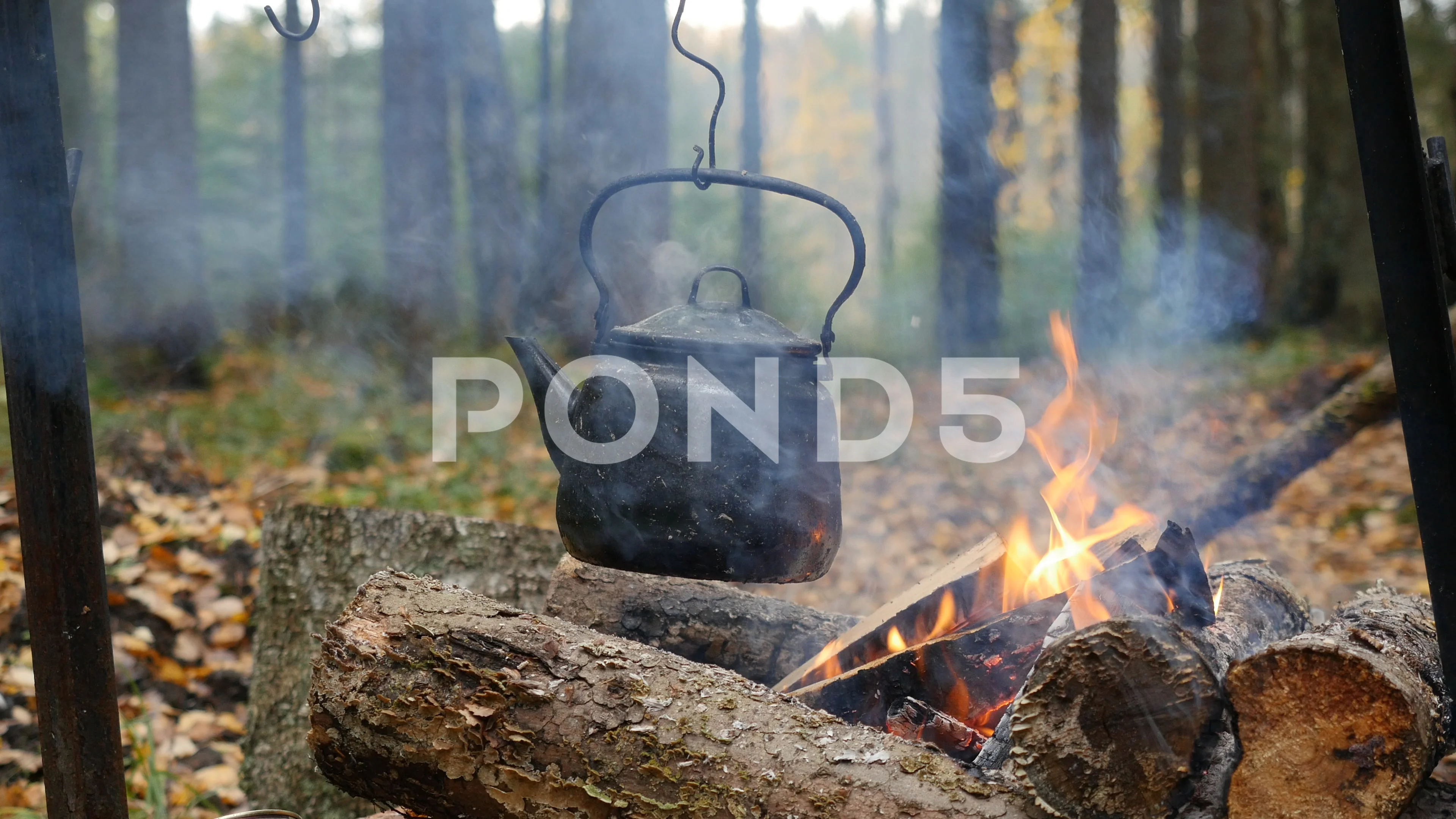 camping - kettle over campfire, Stock Video