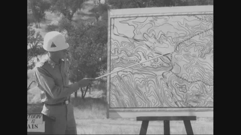 CAMP ROBERTS, CALIFORNIA - 1952: Map briefing - An instructor points to a map Stock Footage 344004310
