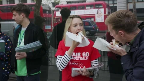 Campaigners hand out leaflets to Australian voters in London Video stock 345298866
