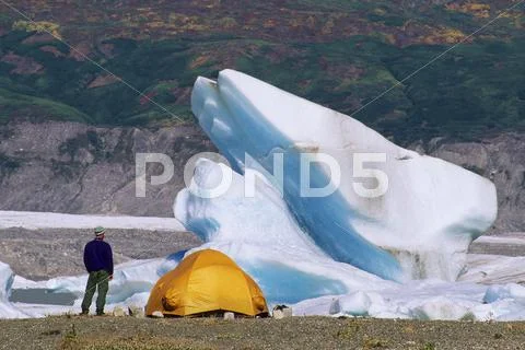 Camper At Lowell Glacier, Alsek River, Kluane National Park, Yukon, Canada.