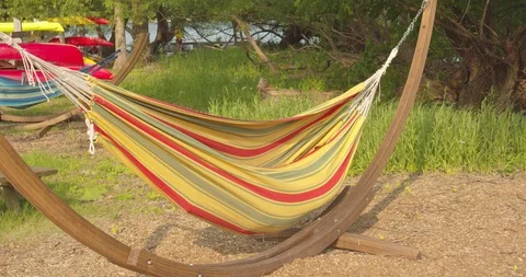 Camper taking a nap in a hammock Stock Footage 115084423