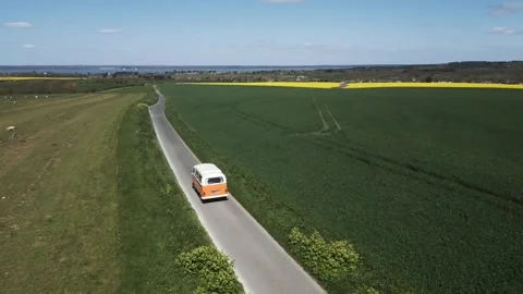 Camper van navigates a narrow hill road in the English countryside Stock Footage 247054740