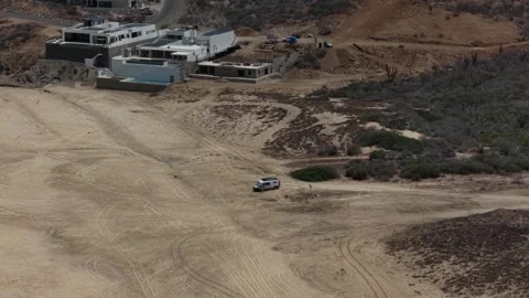 Camper Van on Sandy Beach at Palm Beach Club Cabo San Lucas Aerial Stock Footage 344030170