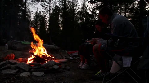 Campers Eat by Campfire Stock Footage 41454054