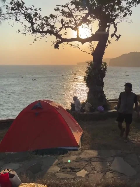 Campers Enjoying Sunset View by Ocean Cliff Stock-Footage 340868300