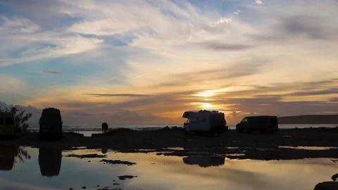 Campers horses sunset contrast Stock Footage 231872553