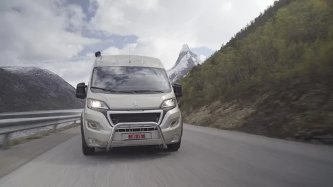Campervan driving on the mountain road Video stock 85832957