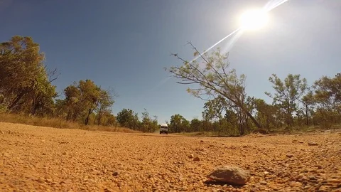 Campervan driving over a go pro camera during a road trip through Australia Stock Footage 92243055