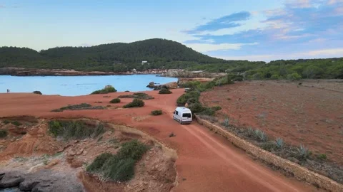 Campervan on Ibiza cliffs drone Renault Traffic Stock Footage 164613232