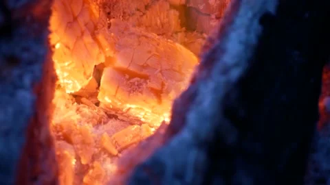 Campfire 4k, Flames Dance on Glowing Wood Fire, Still Handshot Stock Footage 150599524