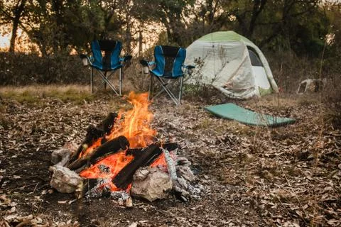 Campfire and camping in a forest Stock Photos