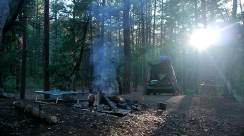 Campfire and SUV in Camping setting #3 Stock Footage 61120090