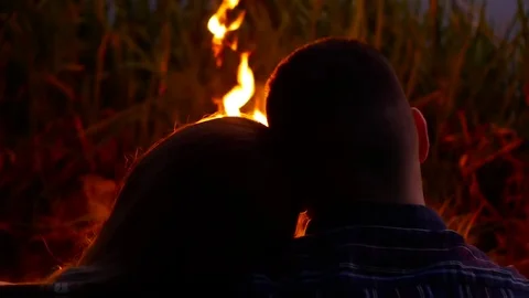 Campfire and young couple Stock Footage 82213702