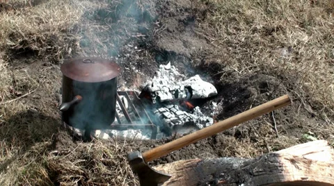 Campfire with axe Stock Footage 32843295