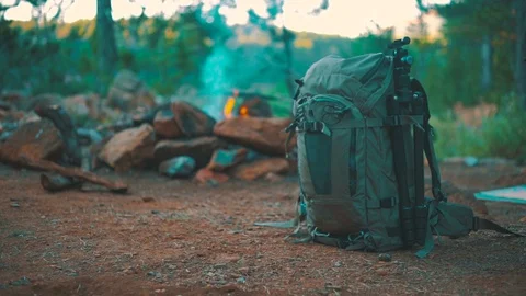 Campfire with backpack Stock Footage 94711531