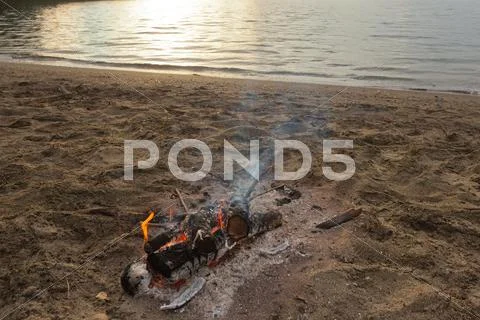 Campfire at beach Stock Photos