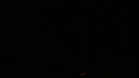 Campfire Burning at Night, Warm Fire Flames in Dark Outdoor Scene Stock Footage 329106445