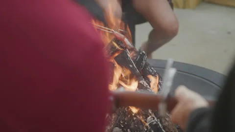 Campfire Burns While Friends Enjoy 스톡 동영상 208793688