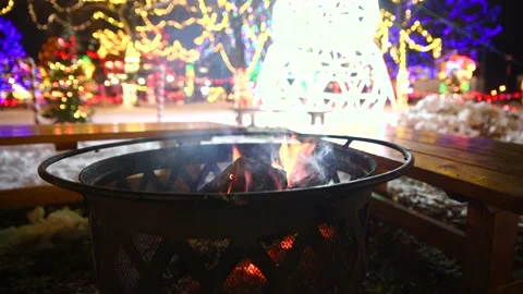 Campfire with Christmas Lights in the Background Vídeo Stock 224996360