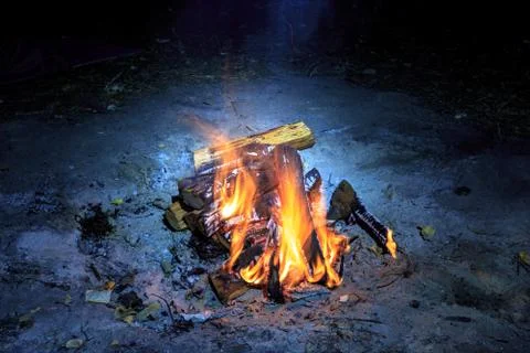 Campfire in darkness Stock Photos