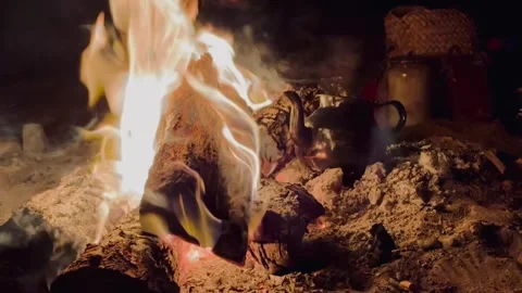 Campfire in the desert with teapot Stock Footage 313593923