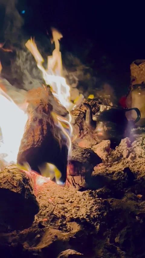 Campfire in the desert with teapot Stock Footage 313593925