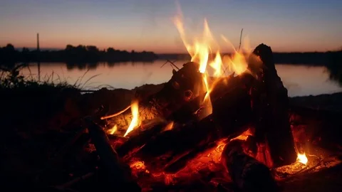 Campfire during a beautiful Sunset on a Beach. Stock-Footage 78029286