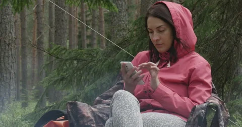 Campfire, enjoy, fire, flame, night, phone Video stock 64795938
