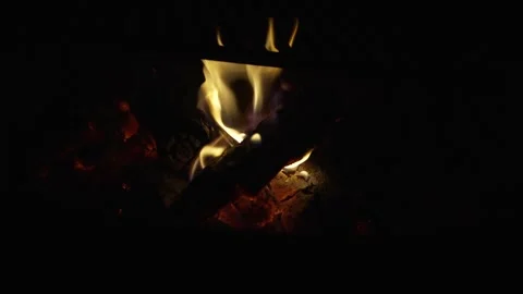 Campfire flames burning in a fire pit at night Stock Footage 346794746