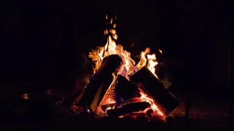Campfire glowing in the Stock Photos