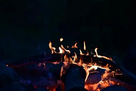 Campfire at night as a close up Stock Photos