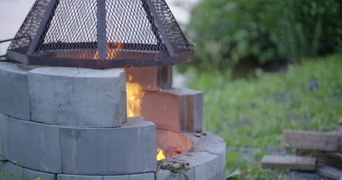 Campfire pit by the lake at evening / Side view / Slow motion 1 動画素材 130928097