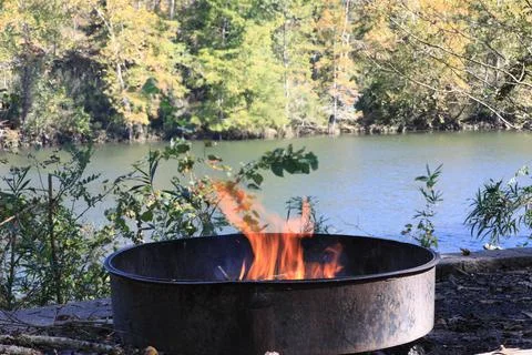 Campfire by the river Stock Photos