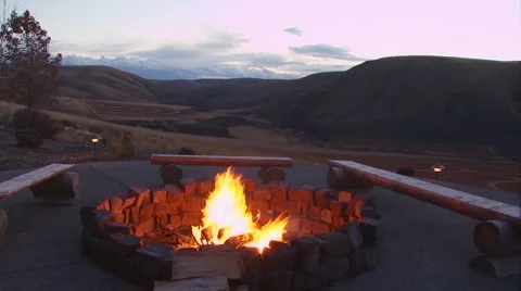 Campfire in sunset at hunting ranch Stock Footage 54593962