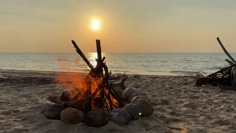 Campfire on the sunset at the tropical beach Stock Footage 277596999