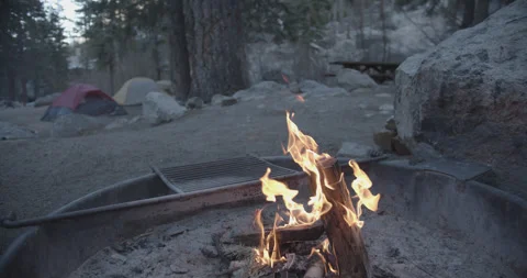 Campfire With Tents In The Background Stock Footage 302776844