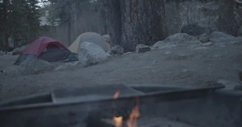 Campfire With Tents In The Background Stock Footage 302838145