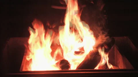 A campfire warms with flickering flames 스톡 동영상 56246105