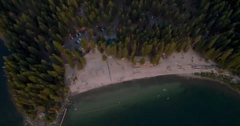 Campground Beach at Sunset Drone Top View Stock Footage 310355078